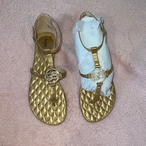 BRAND NEW WITH BOX! Never been worn bebe gold logo sandals! ⚡️✨✨✨✨⚡️⚡️